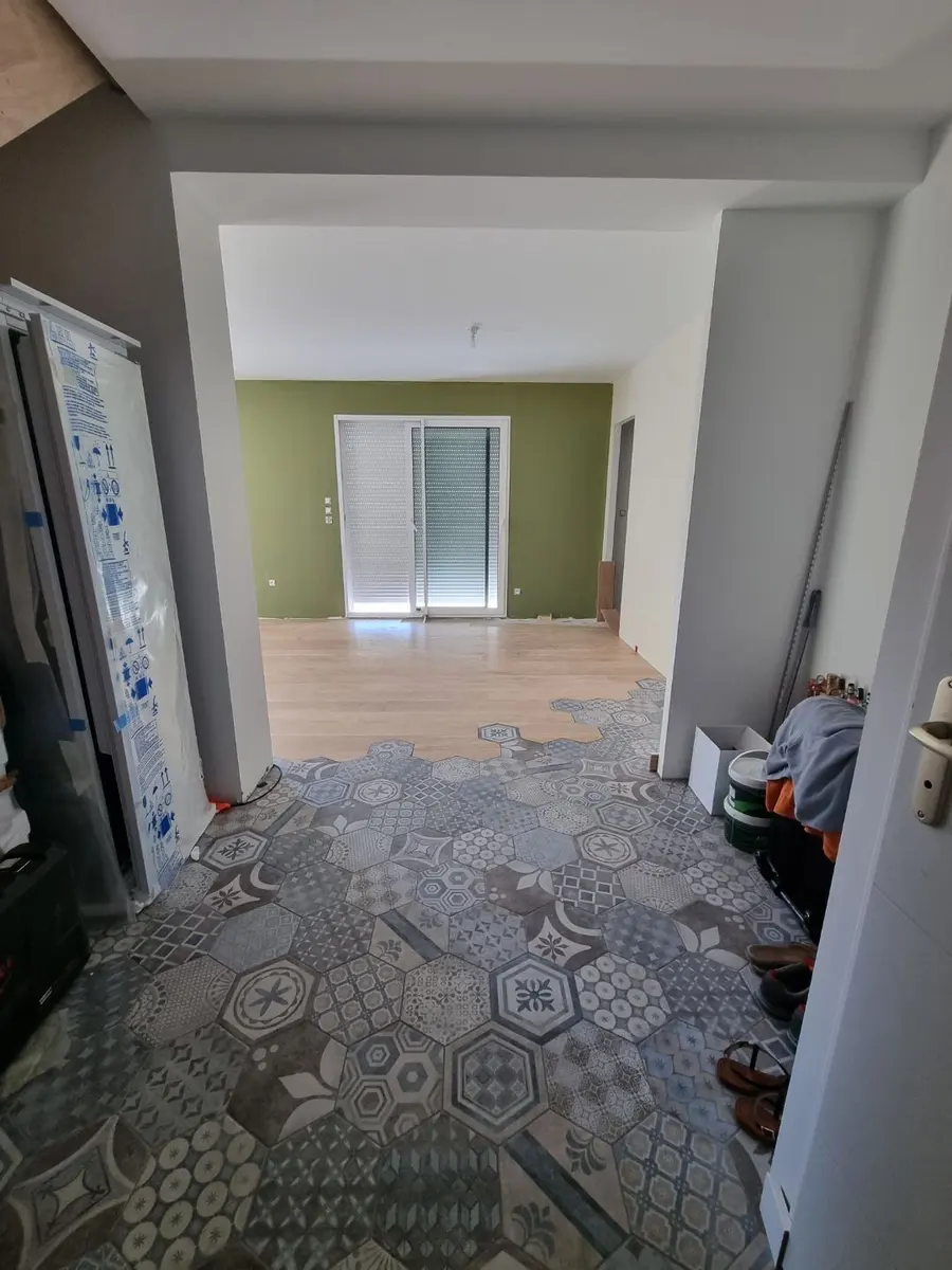 Carrelage & sols après rénovation par LEMY RENOVATION : carreaux de ciment dans l'entrée